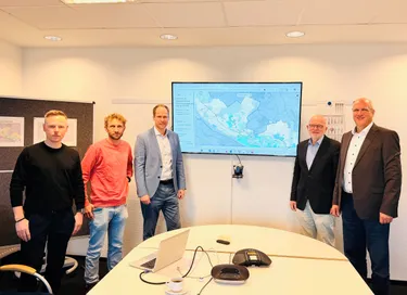 Fünf Vertreter von Immobilien Bremen und enercity contracting im Besprechungsraum